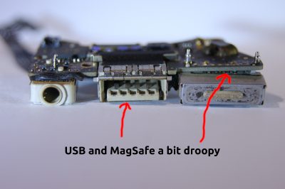 MacBook Air IO board after baking - USB and MagSafe drooping