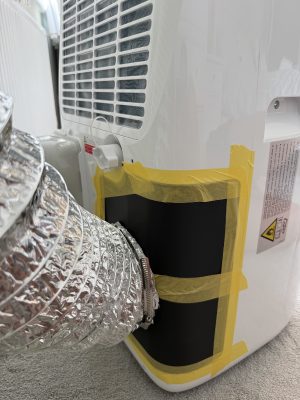 Close up of second hose and modified grille (Garvee CF10 TAC-10CPB/DM7 / 2026 / 06)