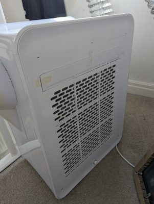 The condenser intake grille that was ducted (ElectriQ AC9000E / Rob / 2026 / 06)